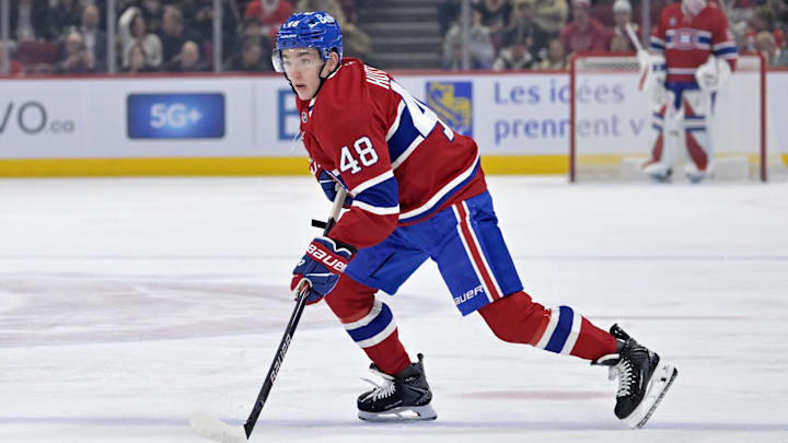 Nov 20, 2025; Montreal, Quebec, CAN; Montreal Canadiens defenseman Lane Hutson (48) plays the puck against the Washington Capitals during the first period at the Bell Centre. Mandatory Credit: Eric Bolte-Imagn Images