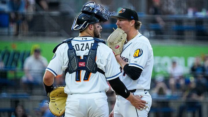 Akron catcher Jacob Cozart (17) meets with Akron pitcher Khal Stephen (41) during the home opening day game, April 2, 2026, in Akron, Ohio.