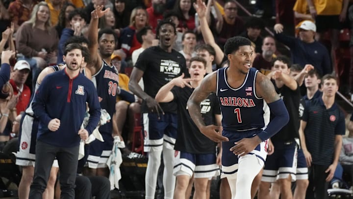 Arizona Wildcats guard Caleb Love (1) reacts after sinking a 3-point shot during a Big 12 men's basketball game against the Arizona State Sun Devils at Desert Financial Arena.