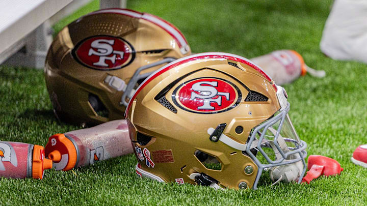 Sep 14, 2025; New Orleans, Louisiana, USA;  Detailed view of the San Francisco 49ers helmets against the New Orleans Saints during the first half at Caesars Superdome. Mandatory Credit: Stephen Lew-Imagn Images