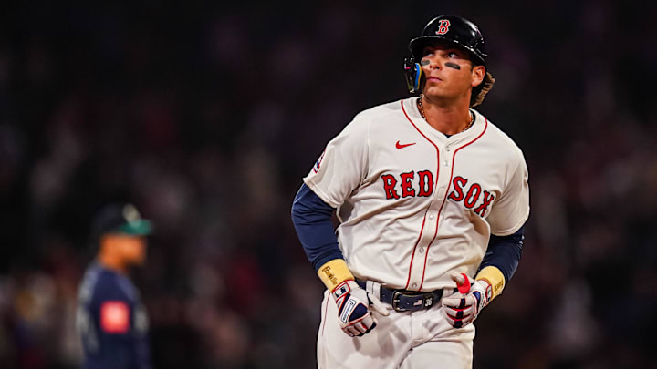 Apr 22, 2025; Boston, Massachusetts, USA; Boston Red Sox first base Triston Casas (36) hits a three run home run against the Seattle Mariners in the seventh inning at Fenway Park. Mandatory Credit: David Butler II-Imagn Images