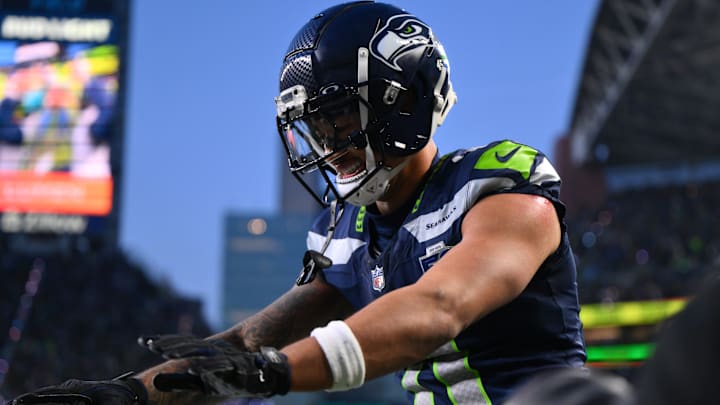 Jan 25, 2026; Seattle, WA, USA; Seattle Seahawks wide receiver Jaxon Smith-Njigba (11) celebrates after scoring a touchdown against the Los Angeles Rams during the first half in the 2026 NFC Championship Game at Lumen Field. 