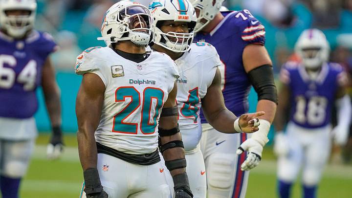 Miami Dolphins linebacker Jordyn Brooks (20) and defensive tackle Jordan Phillips (94) celebrate a fourth down stop against the Buffalo Bills during the fourth quarter at Hard Rock Stadium during the 2025 season. Miami Dolphins linebacker Jordyn Brooks (20) and defensive tackle Jordan Phillips (94) celebrate a fourth down stop against the Buffalo Bills during the fourth quarter at Hard Rock Stadium during the 2025 season.