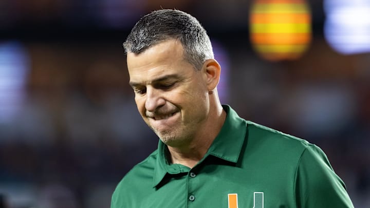 Jan 19, 2026; Miami Gardens, FL, USA; Miami Hurricanes head coach Mario Cristobal reacts against the Indiana Hoosiers during the College Football Playoff National Championship game at Hard Rock Stadium. Mandatory Credit: Mark J. Rebilas-Imagn Images Jan 19, 2026; Miami Gardens, FL, USA; Miami Hurricanes head coach Mario Cristobal reacts against the Indiana Hoosiers during the College Football Playoff National Championship game at Hard Rock Stadium. Mandatory Credit: Mark J. Rebilas-Imagn Images