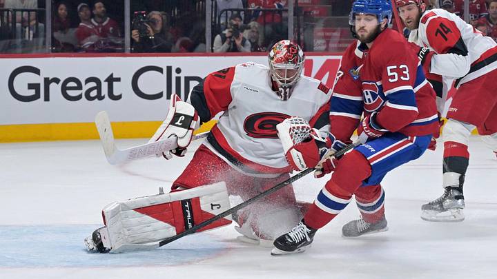 May 25, 2026; Montreal, Quebec, CAN; Carolina Hurricanes goaltender Frederik Andersen (31) watches the puck against Montreal Canadiens defenseman Noah Dobson (53) during the first period in game three of the Eastern Conference Final of the 2026 Stanley Cup Playoffs at Bell Centre. Mandatory Credit: Eric Bolte-Imagn Images