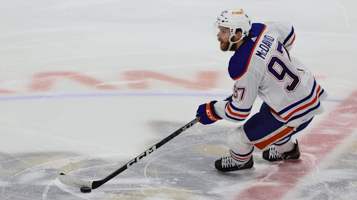 Jun 8, 2024; Sunrise, Florida, USA; Edmonton Oilers forward Connor McDavid (97) controls the puck during the second period against the Florida Panthers in game one of the 2024 Stanley Cup Final at Amerant Bank Arena. Mandatory Credit: Sam Navarro-USA TODAY Sports