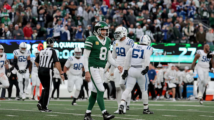 New York Jets quarterback Aaron Rodgers (8) walks off the field after losing to the Indianapolis Colts at MetLife Stadium. 