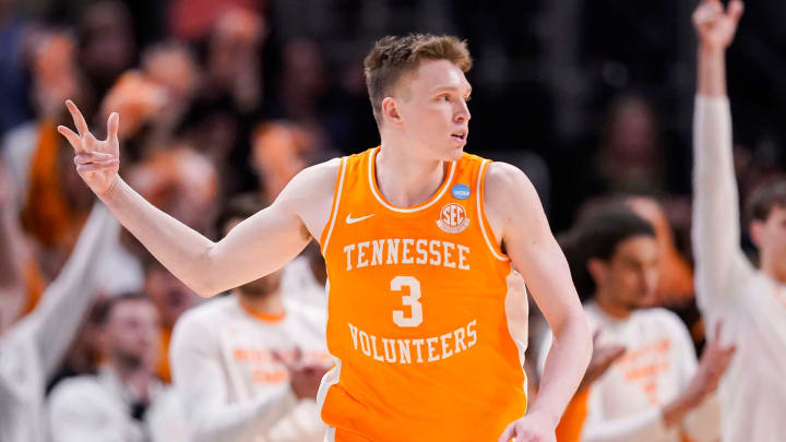 Tennessee Volunteers guard Dalton Knecht (3) holds up three fingers to celebrate a three-point basket Sunday, March 31, 2024, during the midwest regional championship at the Little Caesars Arena in Detroit. The Purdue Boilermakers defeated the Tennessee Volunteers, 72-66. Tennessee Volunteers guard Dalton Knecht (3) holds up three fingers to celebrate a three-point basket Sunday, March 31, 2024, during the midwest regional championship at the Little Caesars Arena in Detroit. The Purdue Boilermakers defeated the Tennessee Volunteers, 72-66.