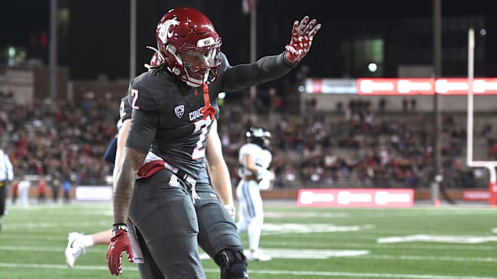 Washington State Cougars wide receiver Kyle Williams celebrates touchdown against the Utah State Aggies Washington State Cougars wide receiver Kyle Williams celebrates touchdown against the Utah State Aggies