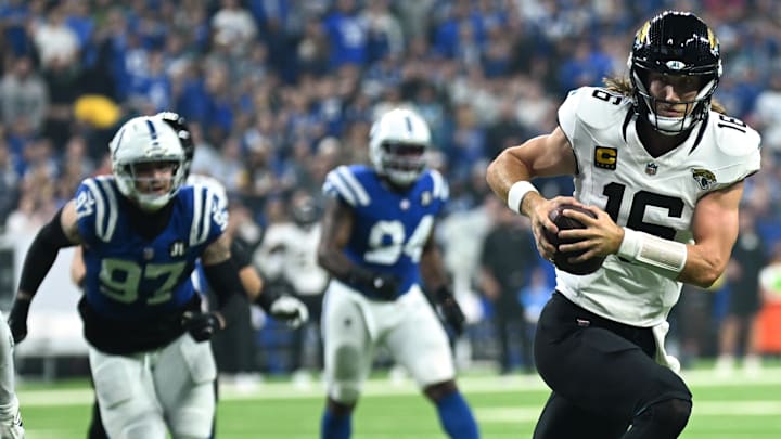 Dec 28, 2025; Indianapolis, Indiana, USA; Jacksonville Jaguars quarterback Trevor Lawrence (16) scores a touchdown against Indianapolis Colts safety Nick Cross (20) during the first half at Lucas Oil Stadium. Mandatory Credit: Robert Goddin-Imagn Images Dec 28, 2025; Indianapolis, Indiana, USA; Jacksonville Jaguars quarterback Trevor Lawrence (16) scores a touchdown against Indianapolis Colts safety Nick Cross (20) during the first half at Lucas Oil Stadium. Mandatory Credit: Robert Goddin-Imagn Images