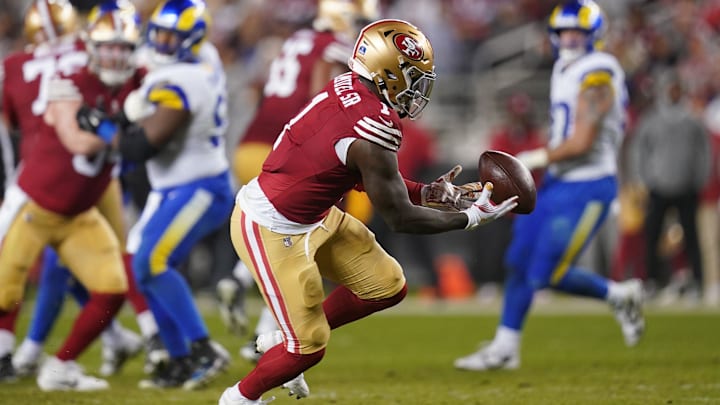 Dec 12, 2024; Santa Clara, California, USA; San Francisco 49ers wide receiver Deebo Samuel Sr. (1) drops the ball after attempting to make a catch against the Los Angeles Rams in the third quarter at Levi's Stadium. Mandatory Credit: Cary Edmondson-Imagn Images