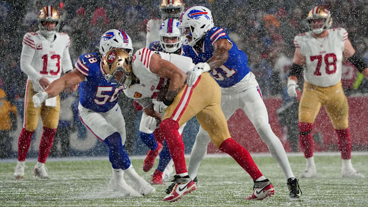 Dec 1, 2024; Orchard Park, New York, USA; Buffalo Bills cornerback Rasul Douglas (31) and Buffalo Bills linebacker Matt Milano (58) tackle San Francisco 49ers tight end George Kittle (85) after he made a catch during the first half at Highmark Stadium. Dec 1, 2024; Orchard Park, New York, USA; Buffalo Bills cornerback Rasul Douglas (31) and Buffalo Bills linebacker Matt Milano (58) tackle San Francisco 49ers tight end George Kittle (85) after he made a catch during the first half at Highmark Stadium.