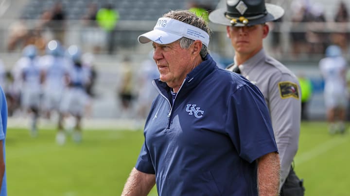 Sep 20, 2025; Orlando, Florida, USA; North Carolina Tar Heels head coach Bill Belichick walks into the field before the game against the UCF Knights at the Bounce House Stadium. Mandatory Credit: Mike Watters-Imagn Images