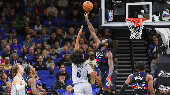 Nov 23, 2024; Orlando, Florida, USA; Detroit Pistons center Isaiah Stewart (28) blocks a shot by Orlando Magic guard Anthony Black (0) during the second quarter at Kia Center. Mandatory Credit: Mike Watters-Imagn Images