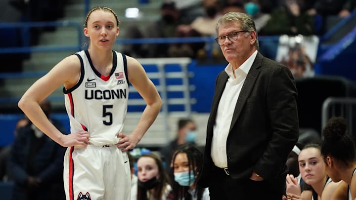 Feb 25, 2022; Hartford, Connecticut, USA; UConn Huskies head coach Geno Auriemma talks with guard Paige Bueckers (5) from the sideline as they take on the St. John's Red Storm in the second half at XL Center. Mandatory Credit: David Butler II-Imagn Images Feb 25, 2022; Hartford, Connecticut, USA; UConn Huskies head coach Geno Auriemma talks with guard Paige Bueckers (5) from the sideline as they take on the St. John's Red Storm in the second half at XL Center. Mandatory Credit: David Butler II-Imagn Images