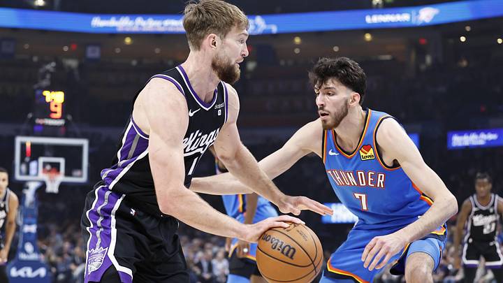 Apr 9, 2024; Oklahoma City, Oklahoma, USA; Sacramento Kings forward Domantas Sabonis (10) drives to the basket as Oklahoma City Thunder forward Chet Holmgren (7) defends during the first quarter at Paycom Center. Apr 9, 2024; Oklahoma City, Oklahoma, USA; Sacramento Kings forward Domantas Sabonis (10) drives to the basket as Oklahoma City Thunder forward Chet Holmgren (7) defends during the first quarter at Paycom Center.