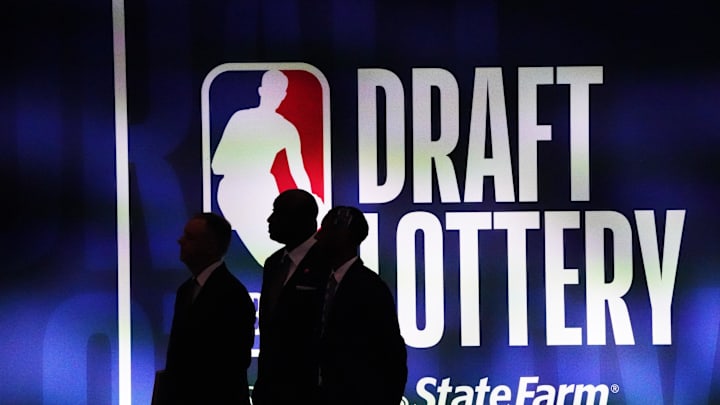 May 16, 2023; Chicago, IL, USA; People walk past the 2023 NBA Draft Lottery board at McCormick Place West. Mandatory Credit: David Banks-Imagn Images