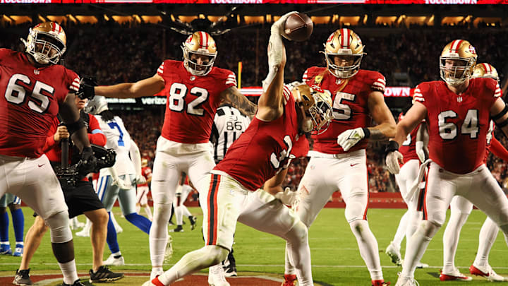 Oct 27, 2024; Santa Clara, California, USA; San Francisco 49ers running back Isaac Guerendo (31) spikes the ball after scoring a touchdown against the Dallas Cowboys during the third quarter at Levi's Stadium. Mandatory Credit: Kelley L Cox-Imagn Images