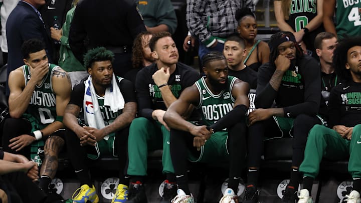 May 29, 2023; Boston, Massachusetts, USA; Boston Celtics forward Jayson Tatum (0) and guard Marcus Smart (36) and forward Blake Griffin (91) and guard Jaylen Brown (7) react from the bench during the fourth quarter against the Miami Heat in game seven of the Eastern Conference Finals for the 2023 NBA playoffs at TD Garden. Mandatory Credit: Winslow Townson-USA TODAY Sports