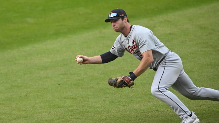 Oct 12, 2024; Cleveland, Ohio, USA; Detroit Tigers second base Colt Keith (33) throws to first base in the seventh inning against the Cleveland Guardians during game five of the ALDS for the 2024 MLB Playoffs at Progressive Field. 