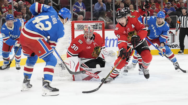 Dec 10, 2025; Chicago, Illinois, USA; New York Rangers center Noah Laba (42) shoots the puck on Chicago Blackhawks goaltender Spencer Knight (30) during the third period at United Center. Mandatory Credit: David Banks-Imagn Images Dec 10, 2025; Chicago, Illinois, USA; New York Rangers center Noah Laba (42) shoots the puck on Chicago Blackhawks goaltender Spencer Knight (30) during the third period at United Center. Mandatory Credit: David Banks-Imagn Images
