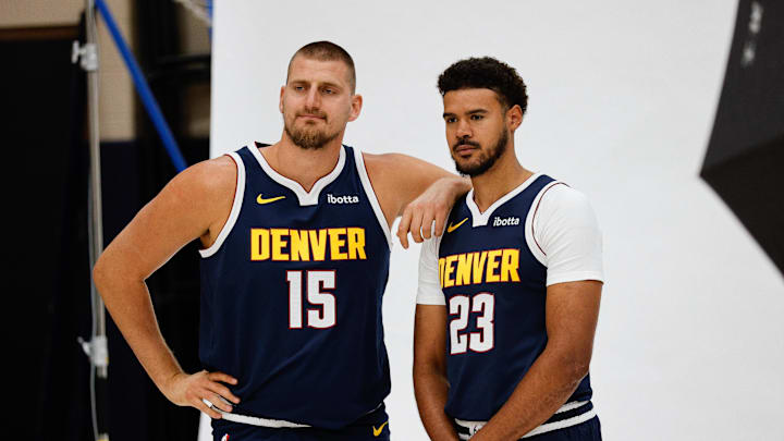 Sep 29, 2025; Denver, CO, USA; Denver Nuggets players Nikola Jokic (15) and Cam Johnson (23) pose for a picture during media day at Ball Arena. Mandatory Credit: Isaiah J. Downing-Imagn Images Sep 29, 2025; Denver, CO, USA; Denver Nuggets players Nikola Jokic (15) and Cam Johnson (23) pose for a picture during media day at Ball Arena. Mandatory Credit: Isaiah J. Downing-Imagn Images
