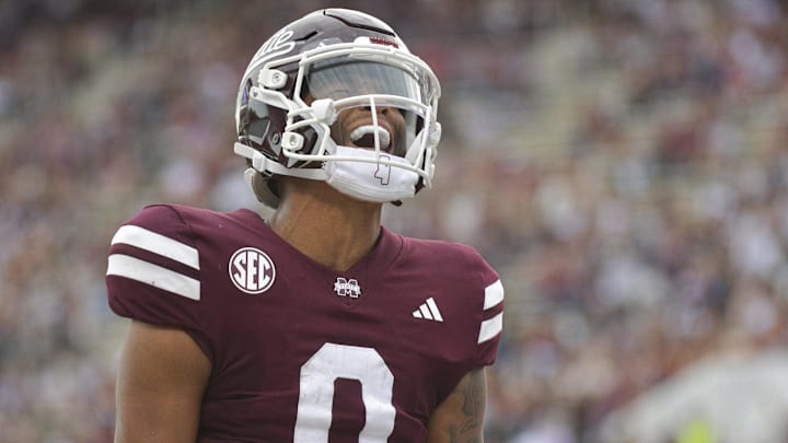 Nov 2, 2024; Starkville, Mississippi, USA; Mississippi State Bulldogs quarterback Michael Van Buren Jr. (0) reacts after a touchdown against the Massachusetts Minutemen during the second quarter at Davis Wade Stadium at Scott Field. Mandatory Credit: Matt Bush-Imagn Images Nov 2, 2024; Starkville, Mississippi, USA; Mississippi State Bulldogs quarterback Michael Van Buren Jr. (0) reacts after a touchdown against the Massachusetts Minutemen during the second quarter at Davis Wade Stadium at Scott Field. Mandatory Credit: Matt Bush-Imagn Images