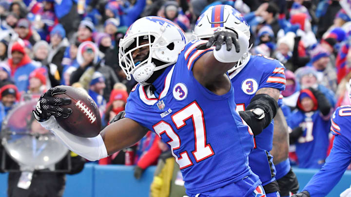 Bills cornerback Tre'Davious White reacts to intercepting a pass against the Patriots in 2023.