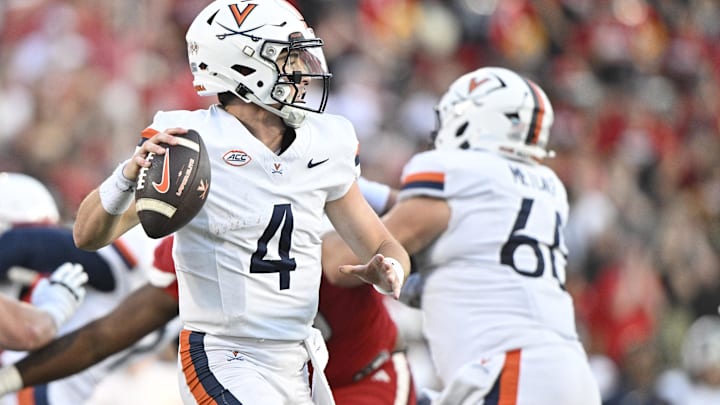 Oct 4, 2025; Louisville, Kentucky, USA; Virginia Cavaliers quarterback Chandler Morris (4) looks to pass against the Louisville Cardinals during the second half at L&N Federal Credit Union Stadium. Virginia defeated Louisville 30-27. Mandatory Credit: Jamie Rhodes-Imagn Images