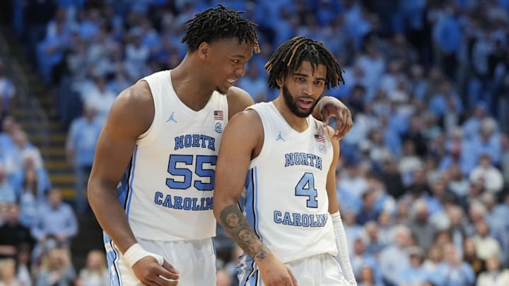 Feb 3, 2024; Chapel Hill, North Carolina, USA; North Carolina Tar Heels forward Harrison Ingram (55) and guard RJ Davis (4) in the second half at Dean E. Smith Center. Mandatory Credit: Bob Donnan-Imagn Images