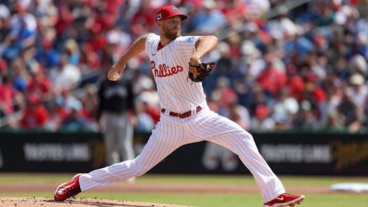 Mar 4, 2025; Clearwater, Florida, USA; Philadelphia Phillies pitcher Zack Wheeler (45) throws a pitch against the New York Yankees in the first inning during spring training at BayCare Ballpark.