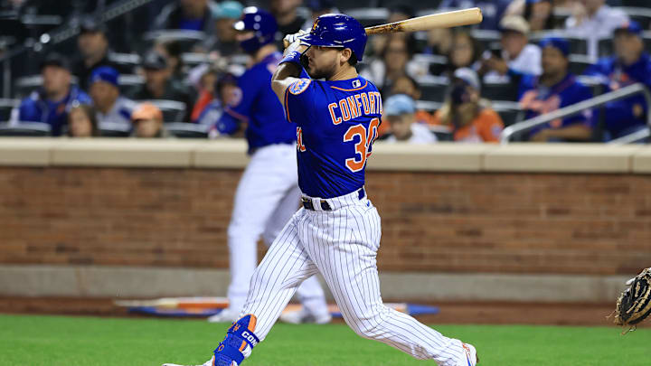 Sep 30, 2021; New York City, New York, USA; New York Mets right fielder Michael Conforto (30) hits