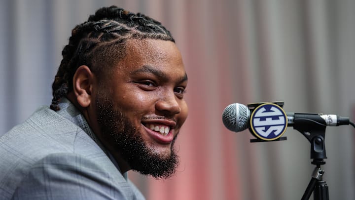 Arkansas Razorbacks defensive lineman Cam Ball answers questions from the media during the SEC Media Days at Omni Atlanta Hotel. 