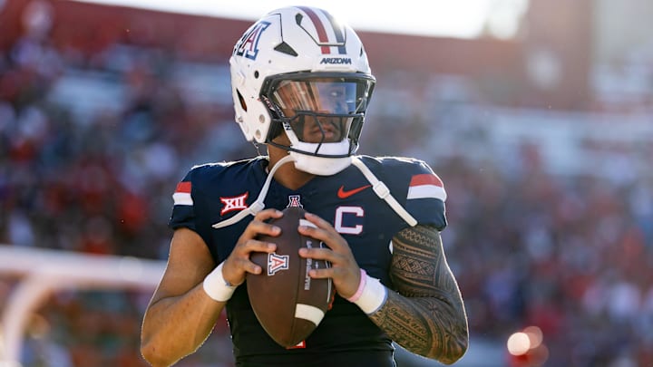 Nov 8, 2025; Tucson, Arizona, USA; Arizona Wildcats quarterback Noah Fifita (1) against the Kansas Jayhawks at Arizona Stadium. Mandatory Credit: Mark J. Rebilas-Imagn Images