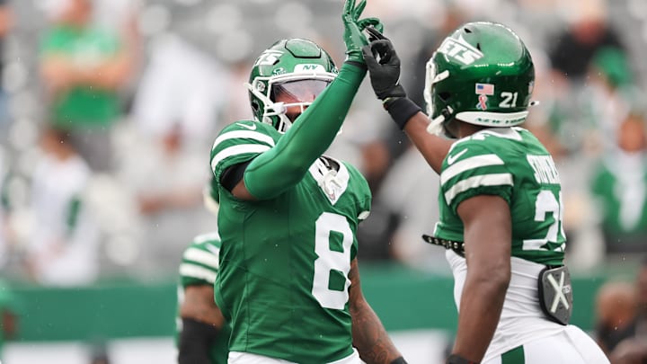 Sep 7, 2025; East Rutherford, New Jersey, USA; New York Jets safety Andre Cisco (8) and New York Jets cornerback Brandon Stephens (21) warm up before the game against the Pittsburgh Steelers at MetLife Stadium. Mandatory Credit: Vincent Carchietta-Imagn Images