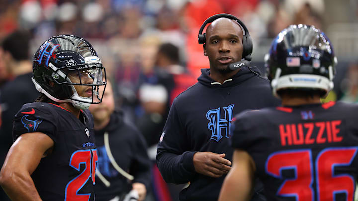 Jan 4, 2026; Houston, Texas, USA;  Houston Texans head coach Demeco Ryans with cornerback Myles Bryant (25) on the sidelines during the second half against the Indianapolis Colts at NRG Stadium. Mandatory Credit: Thomas Shea-Imagn Images