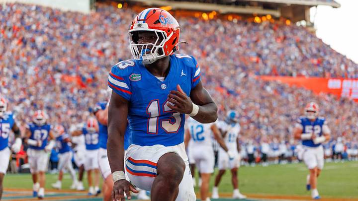 Sep 26, 2026; Gainesville, Florida, USA;  Florida Gators running back Jadan Baugh (13) celebrates with a Heisman pose against the Mississippi Rebels during the second half at Ben Hill Griffin Stadium.  Mandatory Credit: Matt Pendleton-Imagn Images