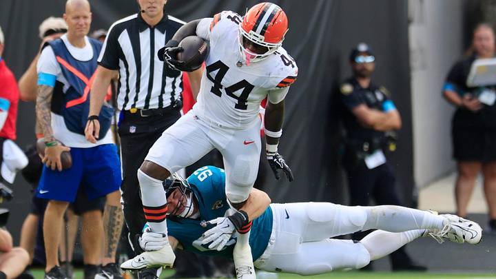 Jacksonville Jaguars defensive end Danny Striggow (92) wraps up with Cleveland Browns tight end Harold Fannin Jr. (44) during the third quarter of an NFL football matchup at EverBank Stadium on Sunday, Sept. 13, 2026, in Jacksonville, Fla. The Jaguars defeated the Browns 34-10. [Corey Perrine/Florida Times-Union]