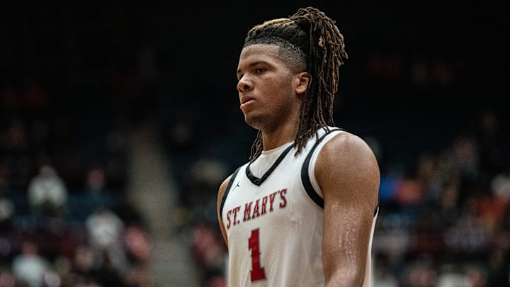 Orchard Lake St. Mary's Trey McKinney walks off the court during the Division 1 boys basketball quarterfinal on Tuesday, March 12, 2024, at Detroit Mercy. Orchard Lake St. Mary's Trey McKinney walks off the court during the Division 1 boys basketball quarterfinal on Tuesday, March 12, 2024, at Detroit Mercy.
