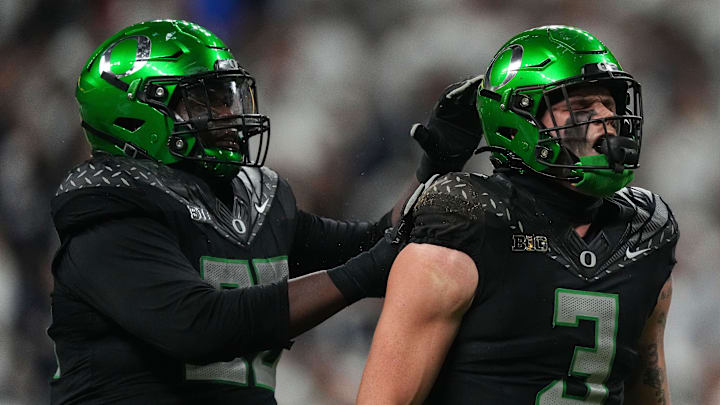 Oregon Ducks defensive back Brandon Johnson (3) yells in excitement Sunday, Dec. 8, 2024, during the Big Ten Championship game at Lucas Oil Stadium in Indianapolis. The Oregon Ducks defeated the Penn State Nittany Lions, 45-37.