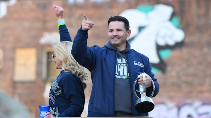 Feb 11, 2026; Seattle, WA, USA; Seattle Seahawks head coach Mike MacDonald interacts with fans during the Super Bowl LX World Champions parade in downtown Seattle. Mandatory Credit: Steven Bisig-Imagn Images