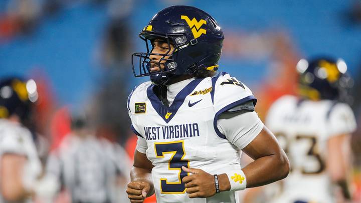 Sep 19, 2026; Charlotte, North Carolina, USA; West Virginia Mountaineers quarterback Michael Hawkins Jr. (3) runs off the field after a series during the first quarter against the Virginia Cavaliers at Bank of America Stadium. Mandatory Credit: Ben Queen-Imagn Images Sep 19, 2026; Charlotte, North Carolina, USA; West Virginia Mountaineers quarterback Michael Hawkins Jr. (3) runs off the field after a series during the first quarter against the Virginia Cavaliers at Bank of America Stadium. Mandatory Credit: Ben Queen-Imagn Images