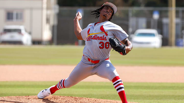 Feb 14, 2026; Jupiter, FL, USA; St. Louis Cardinals pitcher Tink Hence (30) delivers a pitch during a spring training workout at Roger Dean Chevrolet Stadium. Mandatory Credit: Sam Navarro-Imagn Images Feb 14, 2026; Jupiter, FL, USA; St. Louis Cardinals pitcher Tink Hence (30) delivers a pitch during a spring training workout at Roger Dean Chevrolet Stadium. Mandatory Credit: Sam Navarro-Imagn Images