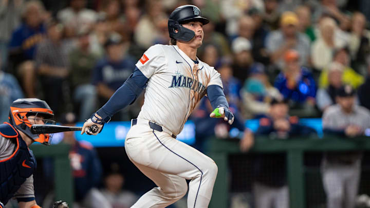Seattle Mariners second baseman Cole Young hits a walk-off, 11th-inning single against the Houston Astros on July 19 at T-Mobile Park. Seattle Mariners second baseman Cole Young hits a walk-off, 11th-inning single against the Houston Astros on July 19 at T-Mobile Park.