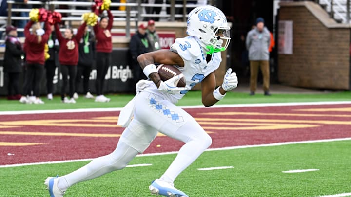 Nov 23, 2024; Chestnut Hill, Massachusetts, USA;  North Carolina Tar Heels wide receiver Chris Culliver (3) runs the ball against the Boston College Eagles during the first half at Alumni Stadium. Mandatory Credit: Eric Canha-Imagn Images