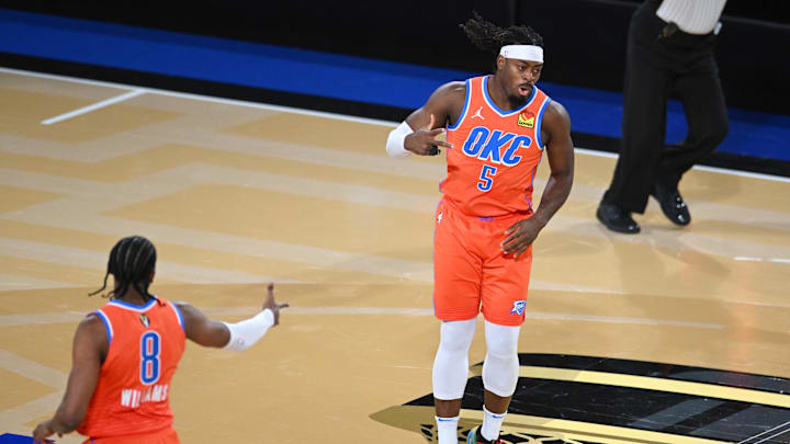 Dec 14, 2024; Las Vegas, Nevada, USA; Oklahoma City Thunder guard Luguentz Dort (5) reacts during the first quarter against the Houston Rockets in a semifinal of the 2024 Emirates NBA Cup at T-Mobile Arena. Mandatory Credit: Candice Ward-Imagn Images