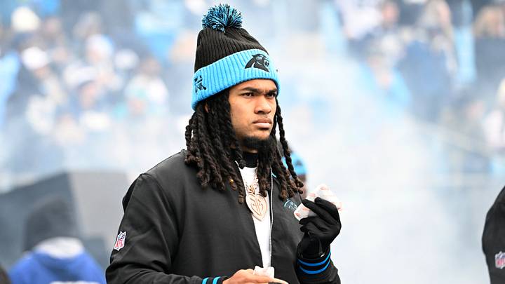 Dec 15, 2024; Charlotte, North Carolina, USA;  Carolina Panthers running back Jonathon Brooks (24) walk on to the field before the game at Bank of America Stadium. 