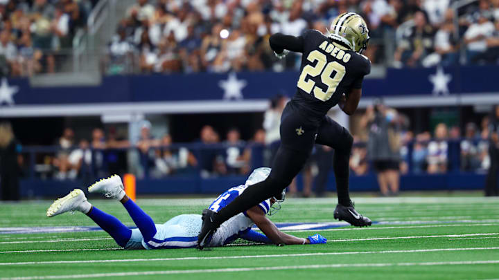 New Orleans Saints cornerback Paulson Adebo (29) intercepts a ball against the Dallas Cowboys