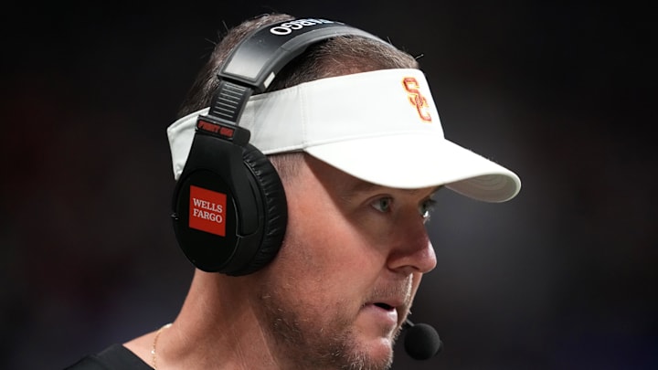 Dec 30, 2025; San Antonio, TX, USA; Southern California Trojans head coach Lincoln Riley watches in the first half against the TCU Horned Frogs during the Alamo Bowl at Alamodome.