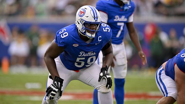 SMU Mustangs offensive lineman PJ Williams lines up during the game between the SMU Mustangs and the Baylor Bears at Gerald J. Ford Stadium. Mandatory Credit: Jerome Miron-Imagn Images